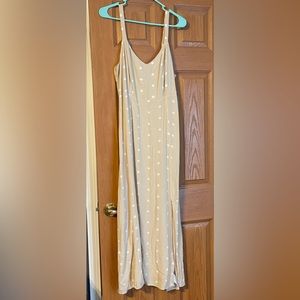 Long, cream colored tank top dress with white polka dots